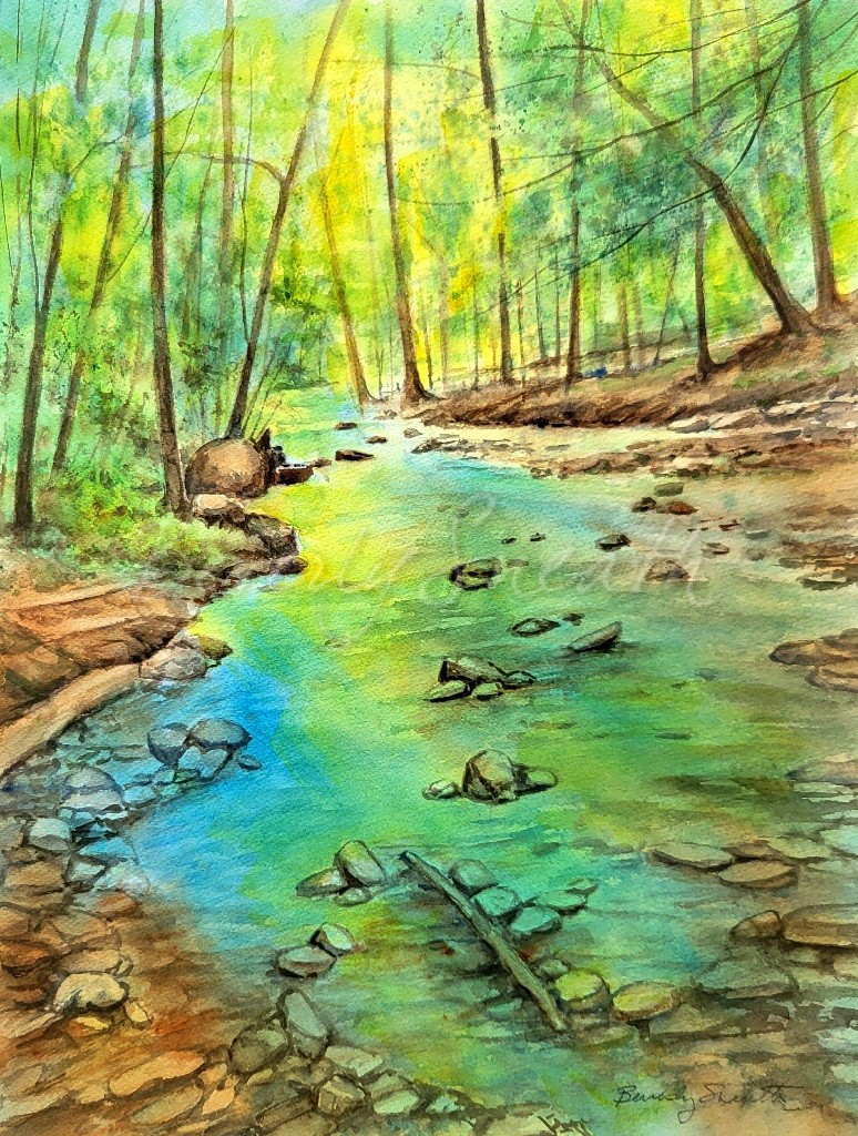 A Scene of a stream with shallow water and bright yellow light through green leaves reflected in the turquoise water of the stram. water, trees, stream, rocks, shallow wter, yellow, blue, green