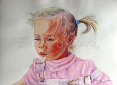 Portrait of a little girl iwith pigtails, pink shirt