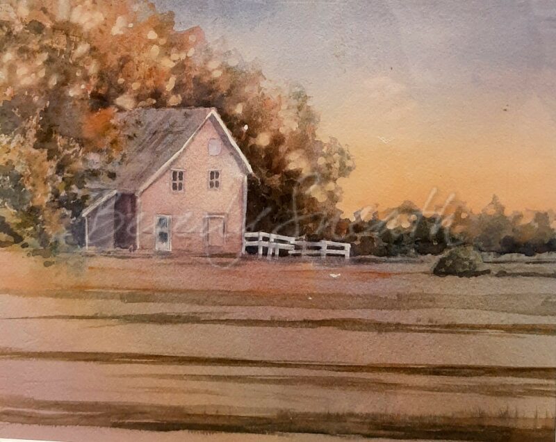 Farmhouse with white fence sunset sky